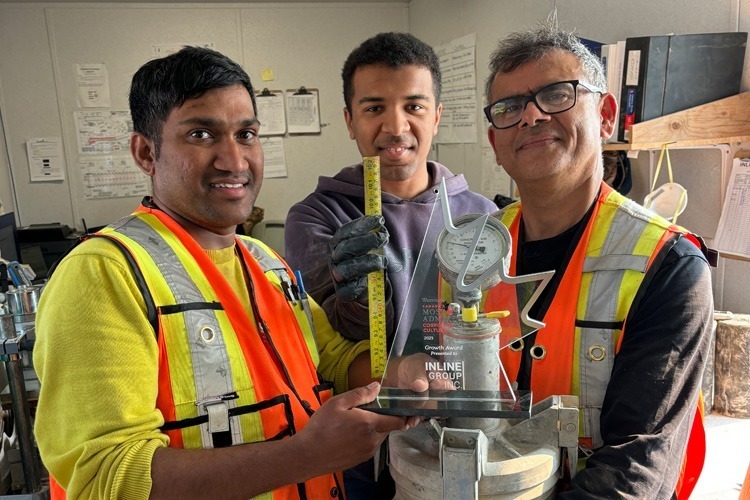 Staff holding the Most Admired Corporate Culture award