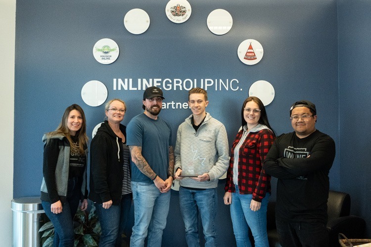 Staff holding the Most Admired Corporate Culture award