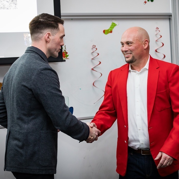 Inline Group staff shaking hands