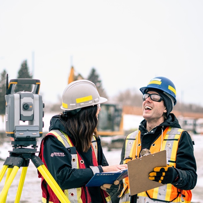 Inline Group staff members sharing a laugh