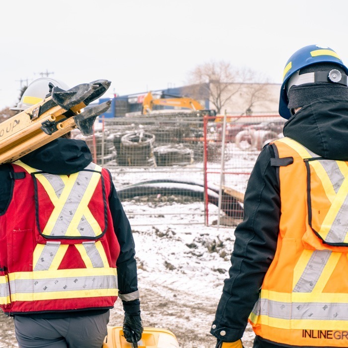 2 Inline Group staff members at work