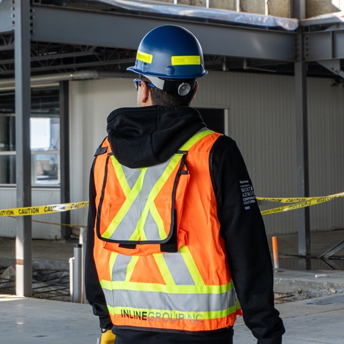 Inline Group staff member wearing a safety vest